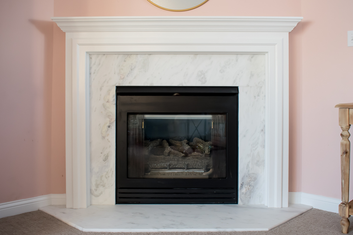 Before and After Honed Marble Fireplace Makeover